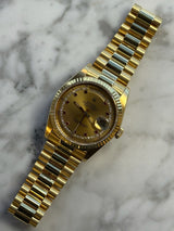 Rolex - Pre-owned Yellow Gold Day-Date Double Quick Set 36mm Ruby & Diamond Champagne Dial 18238LR