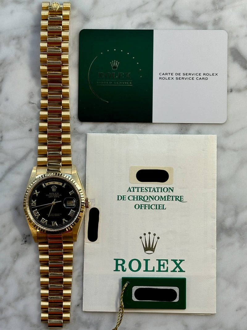 Rolex - Pre-owned Yellow Gold Day-Date 36mm Asian Day & Date-Wheel Black Pyramid Roman Dial 18238