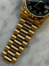 Rolex - Pre-owned Yellow Gold Day-Date 36mm Asian Day & Date-Wheel Black Pyramid Roman Dial 18238