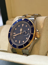 Rolex - Pre-owned Two Tone Yellow Gold Submariner Blue Dial 16613